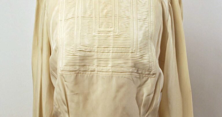 Vintage silk blouse, illustrating the craftsmanship, fabric, and design details of a luxury garment