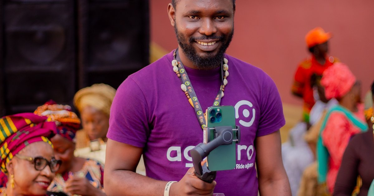 Content creator using a smartphone, representing modern social media content creation