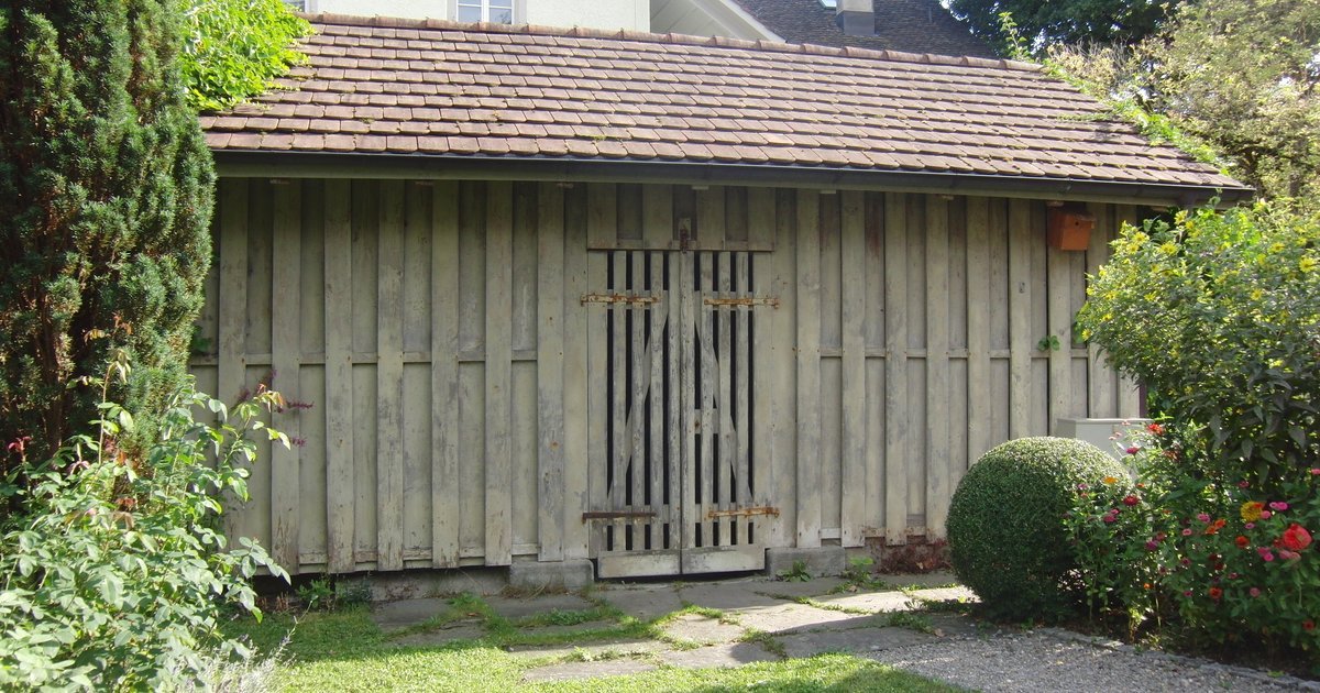 Traditional wooden garden outbuilding, illustrating wooden shed and garden building craftsmanship