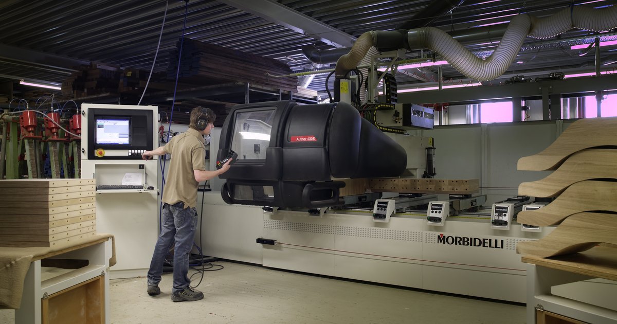 Industrial CNC machine, illustrating the precision metalworking and busbar fabrication technology