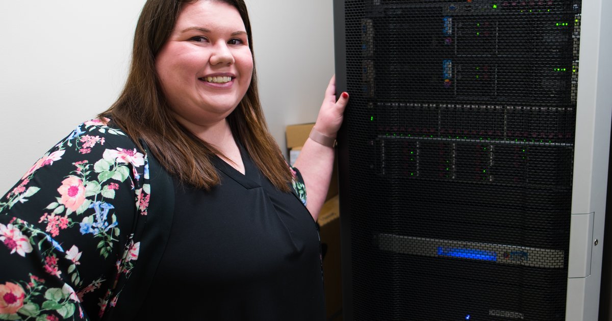 Data analyst at a cybersecurity workstation, representing information security leadership roles
